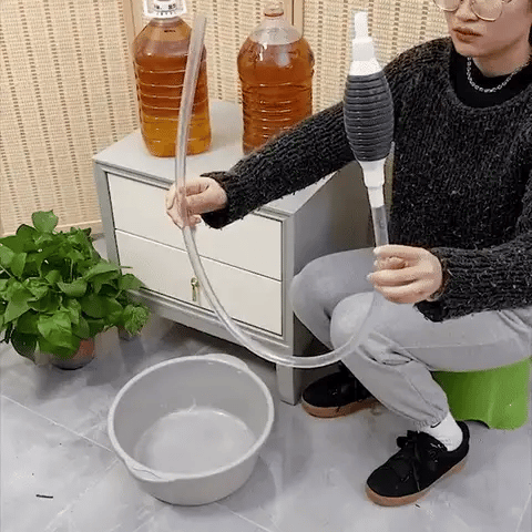 Extracteur manuel de liquide