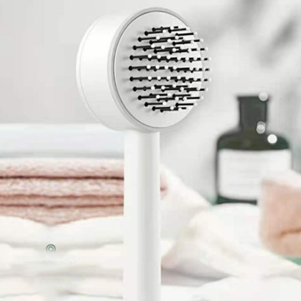 Brosse à cheveux auto nettoyante