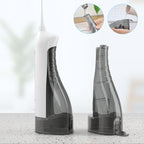 Irrigateur buccal à pression variable avec réservoir d'eau